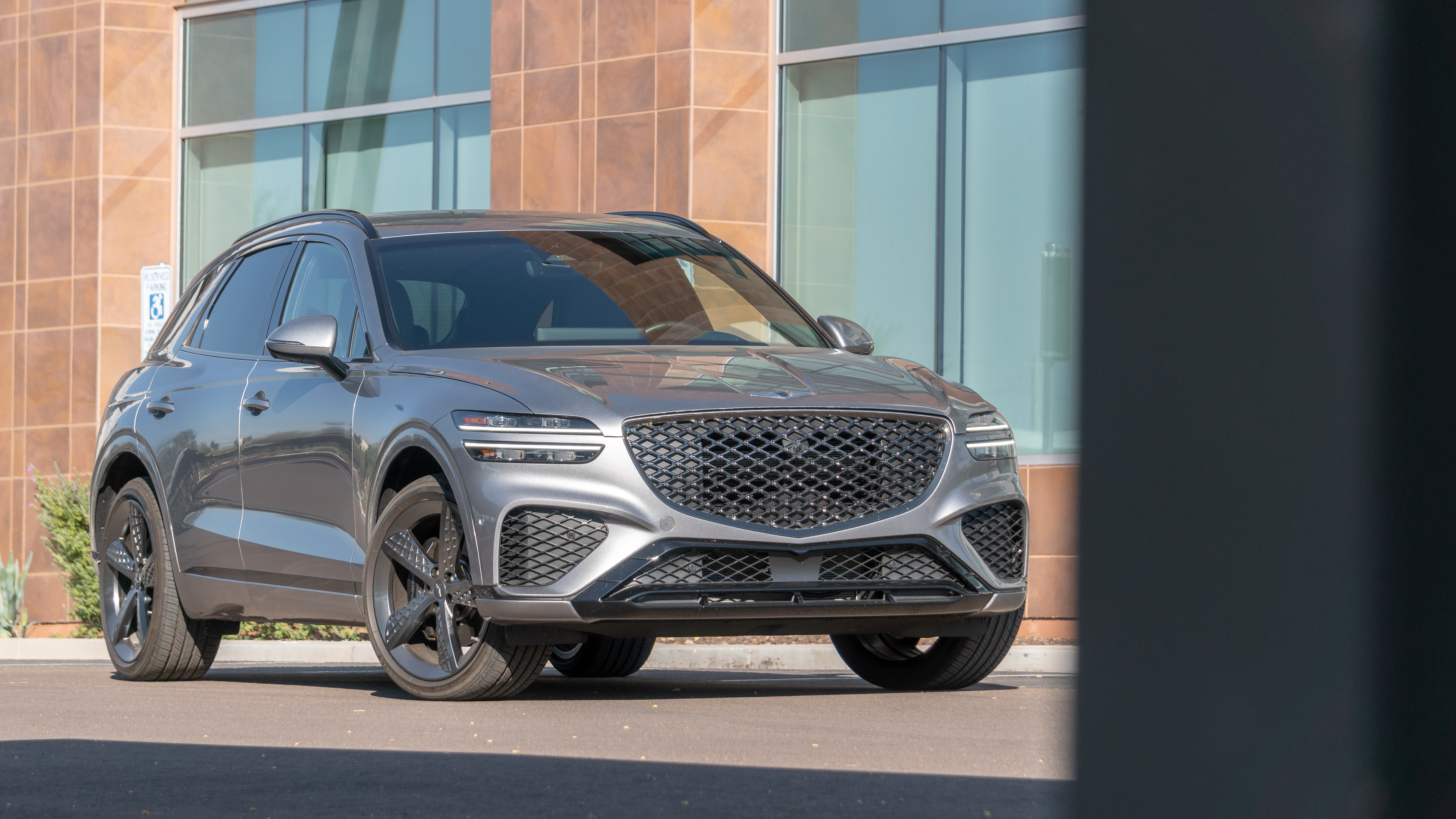 SHUNNING PREMIUM WITH LUXURY QUALTIES: 2022 GENESIS GV70 3.5T SPORT PRESTIGE